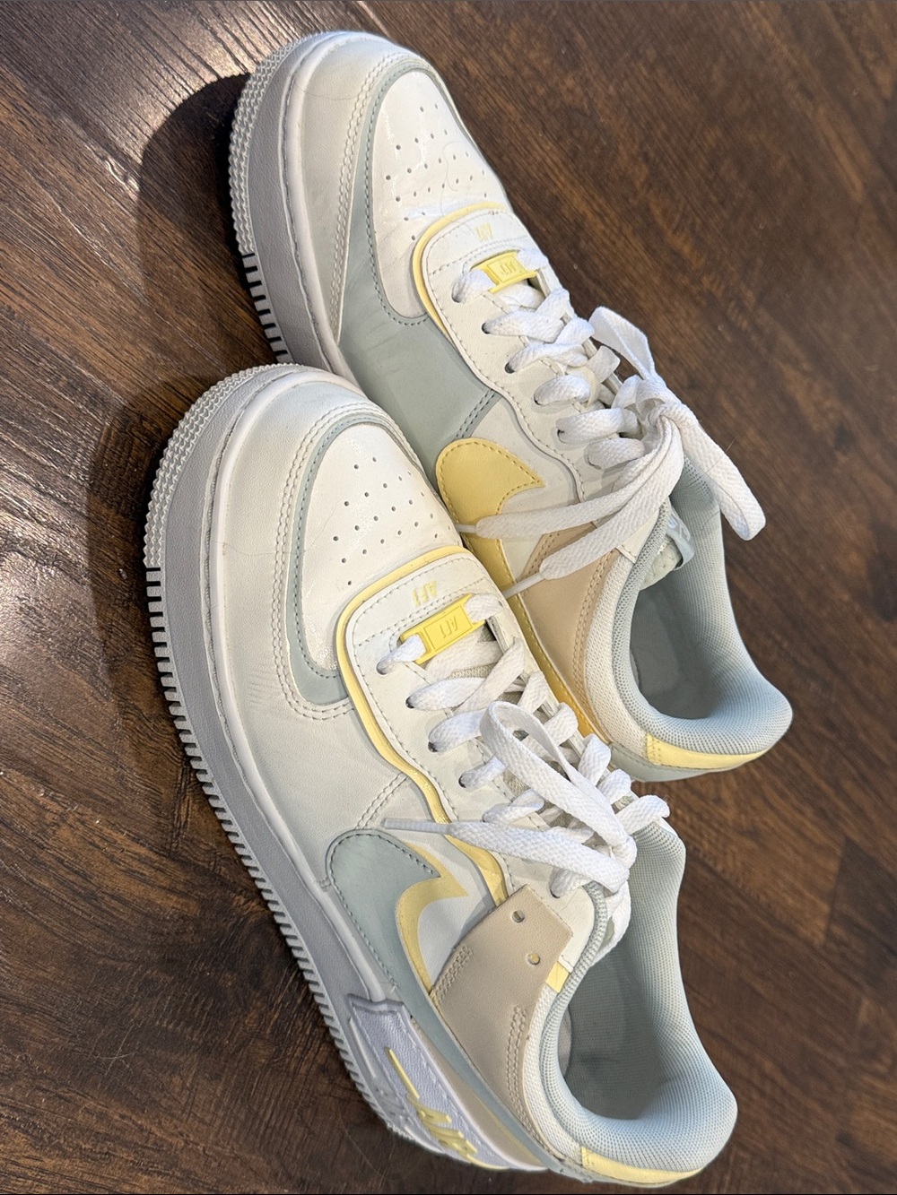 Nike Women’s Low-Top Sneakers in White, Pale Yellow & Light Blue